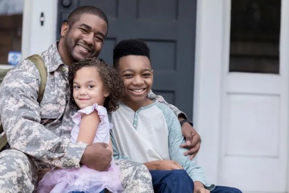 military family on front porch