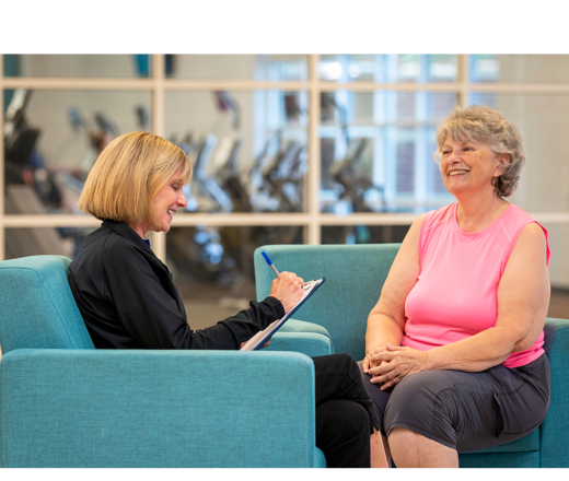 Membership staff working with a member to define wellness goals.