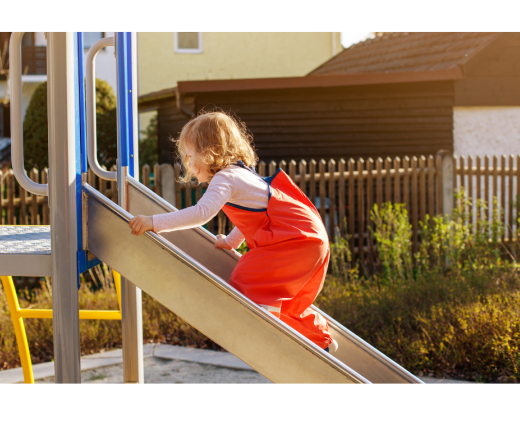 kid on slide